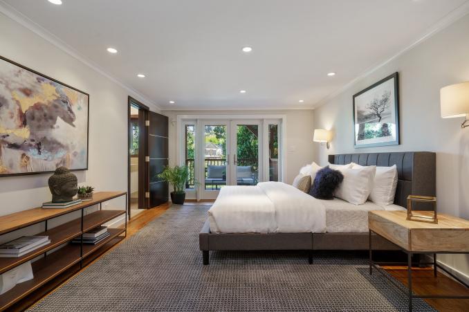 Property Thumbnail: Lower bedroom suite with glass doors leading out