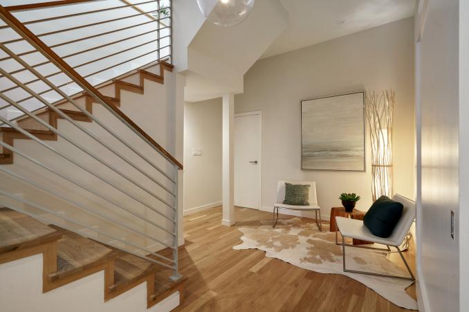 Property Thumbnail: Lower level seating area, featuring wood floors
