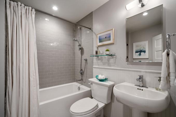 Property Thumbnail: A bathroom with light grey tile