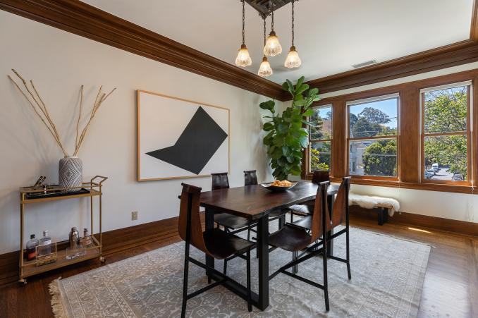 Property Thumbnail: Formal dining room with wood trim and wood floors