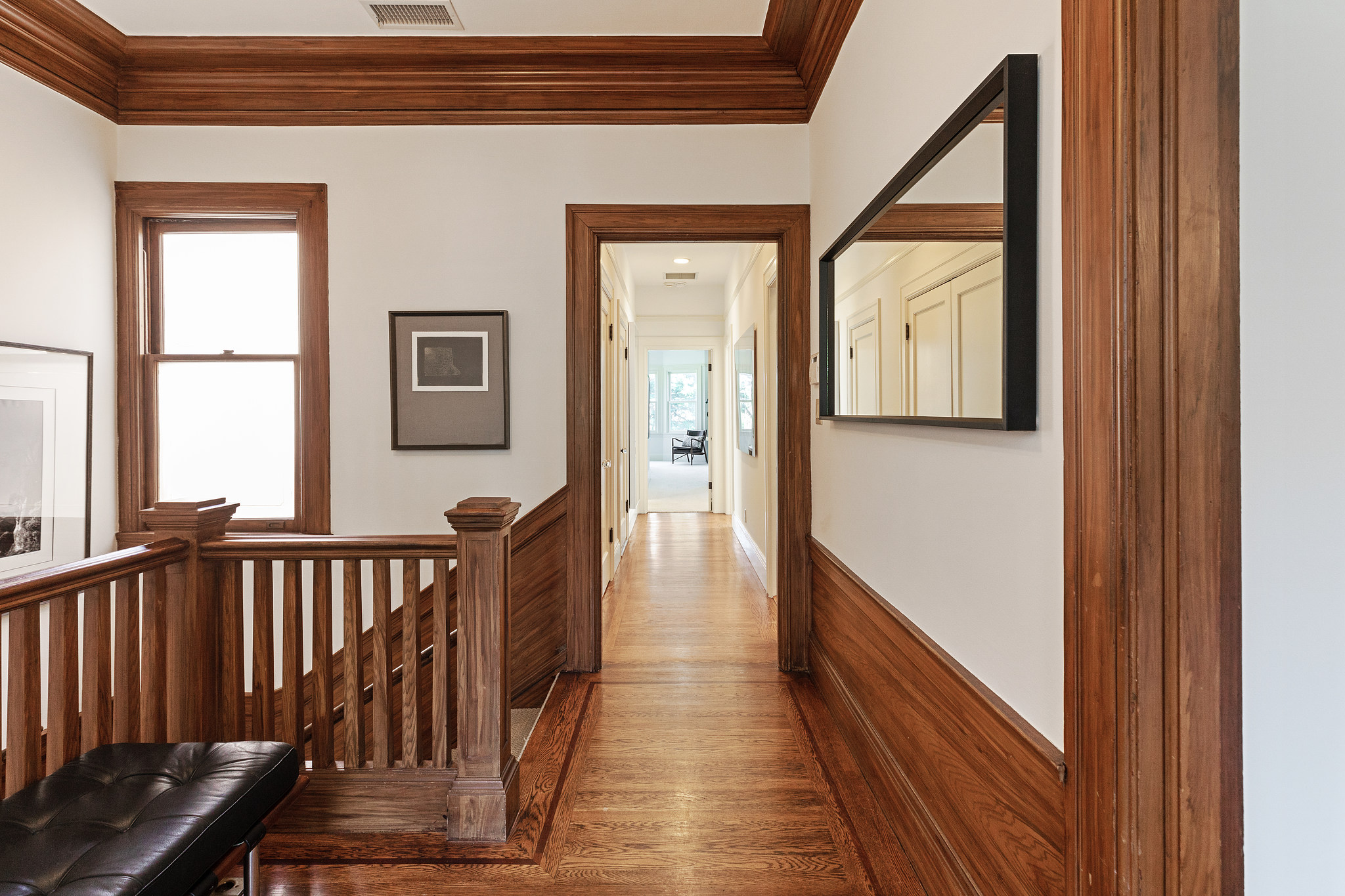 Property Photo: Hallway with wood floors
