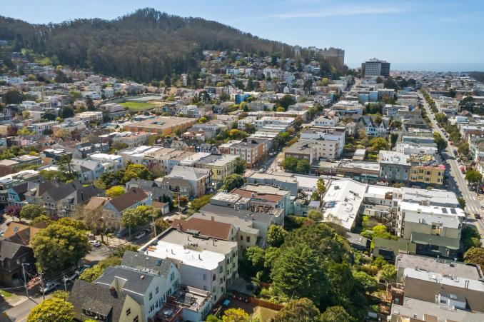 Property Thumbnail: Aerial view of Cole Valley from 38 Parnassus Avenue, featuring Sutro Forrest