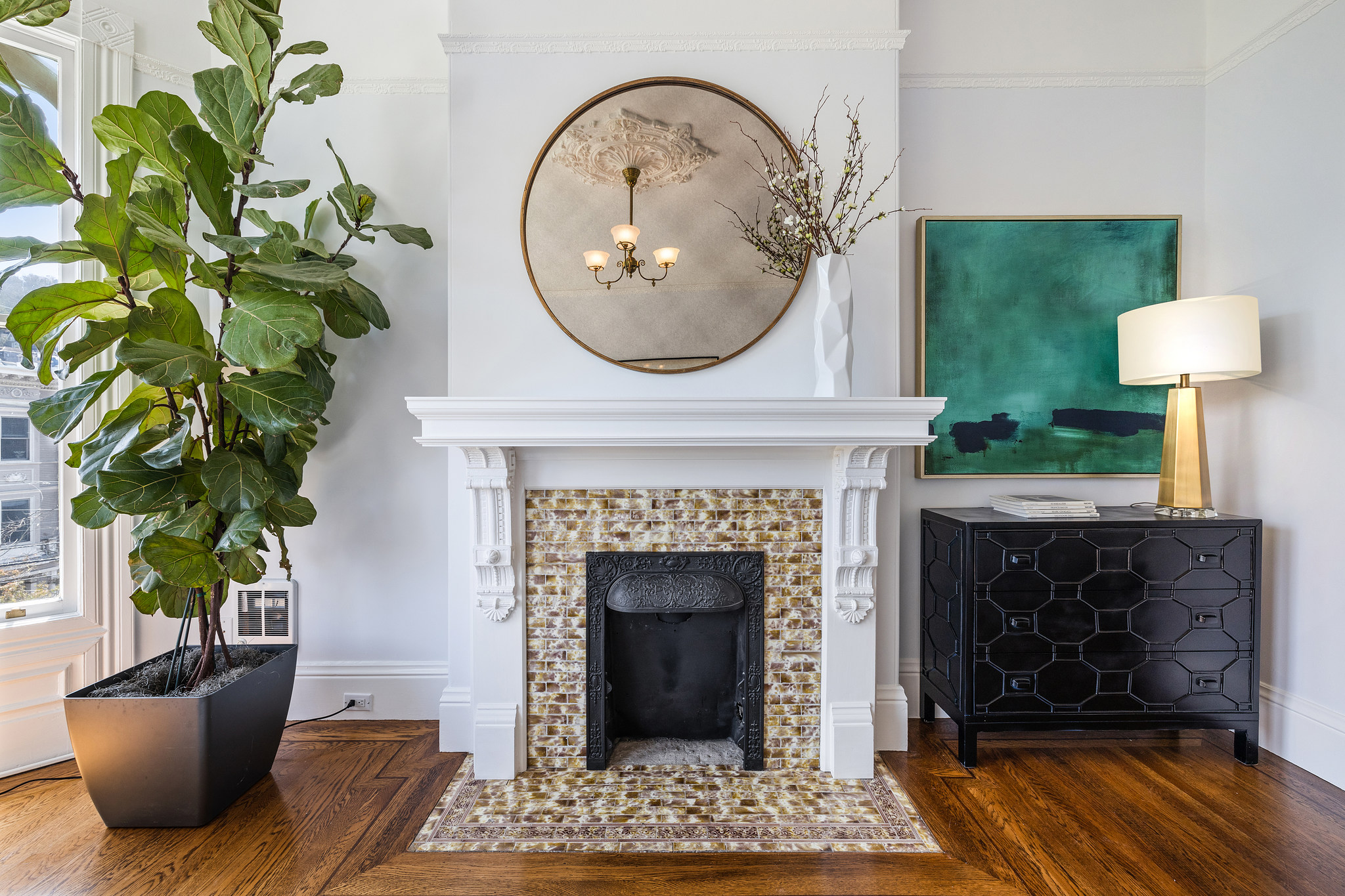 Property Photo: Fireplace with tile and wood mantle 