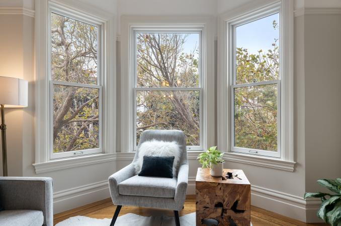 Property Thumbnail: Seating area near three large windows