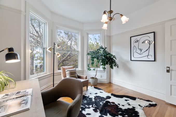 Property Thumbnail: Large windows and artwork adorn the walls of 726 Clayton Street
