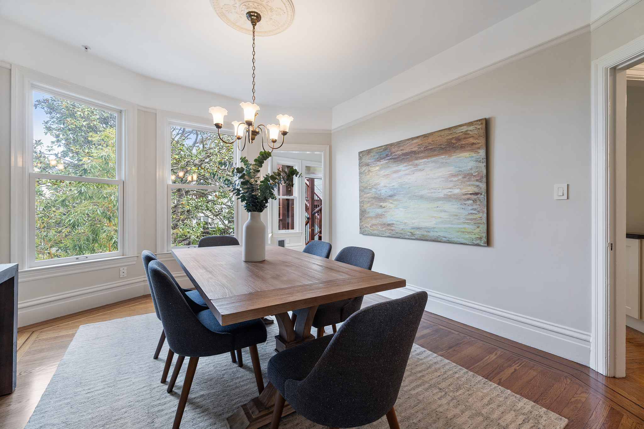 Property Photo: View of the dining rooms beautiful woodwork and large windows