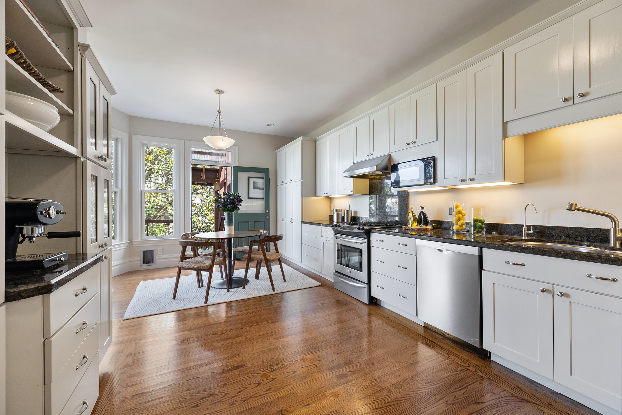 Property Photo: View of the galley style kitchen at 726 Clayton Street