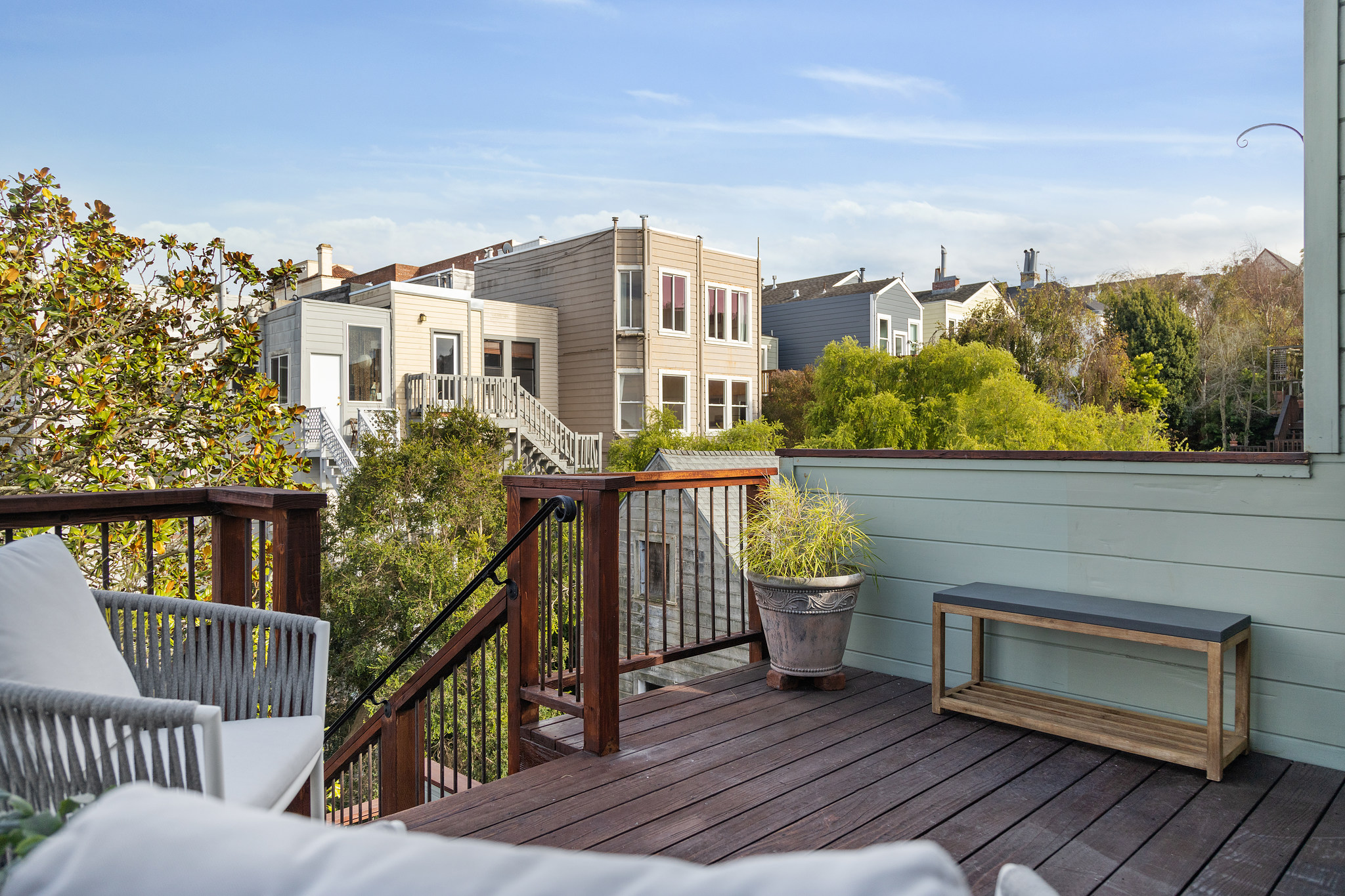 Property Photo: A view from the patio furniture via the top deck at 726 Clayton Street