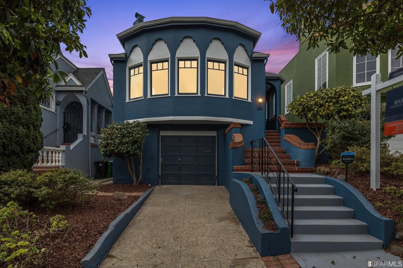 Property Photo: Front exterior view of 78 Wawona Street at dusk