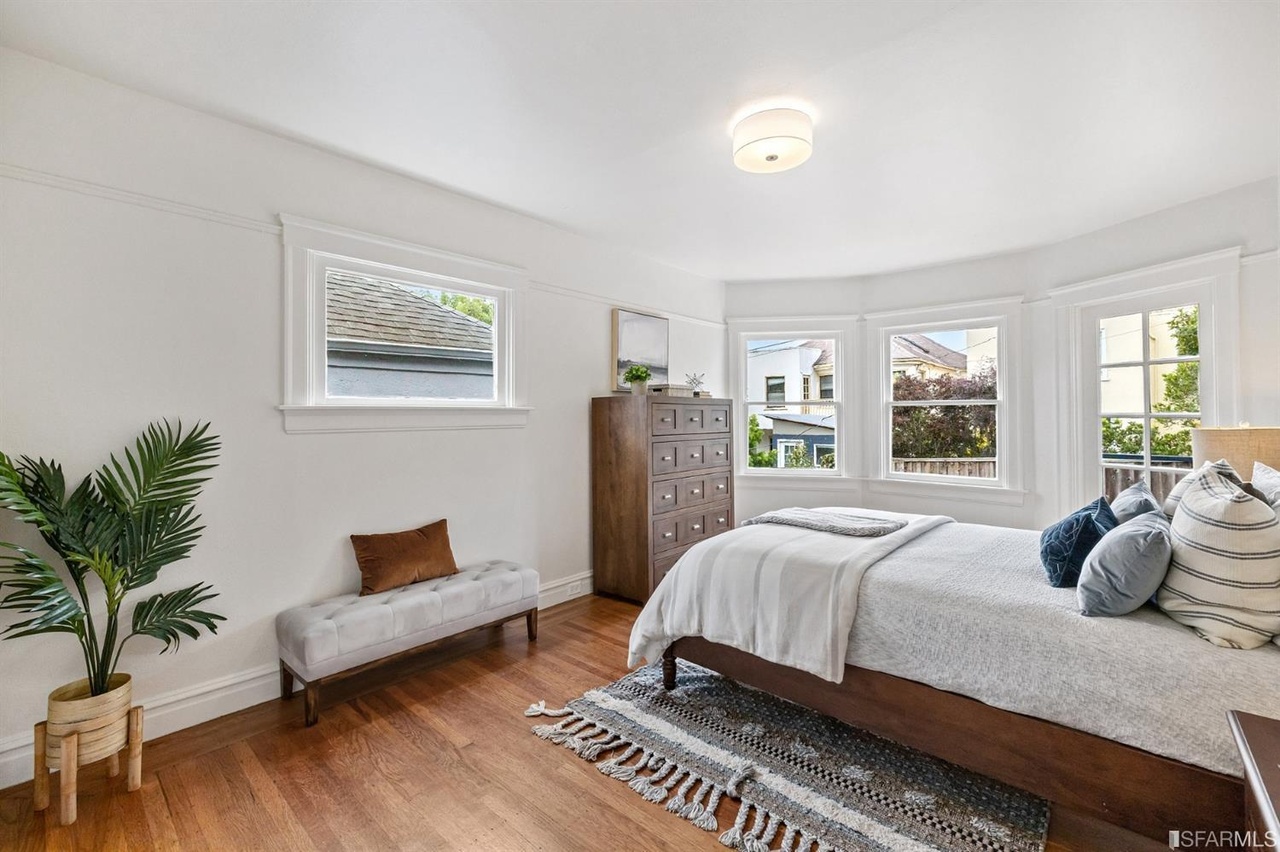 Property Photo: Bedroom at 78 Wawona Street, showing wood floors and several large windows