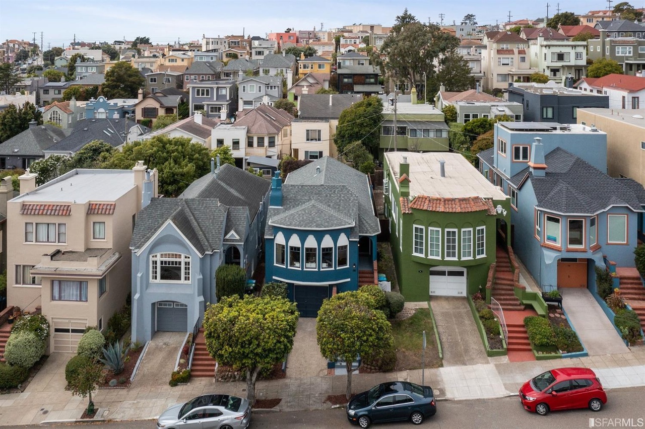 Property Photo: Aerial view of 78 Wawona Street, showing a row of colorful homes