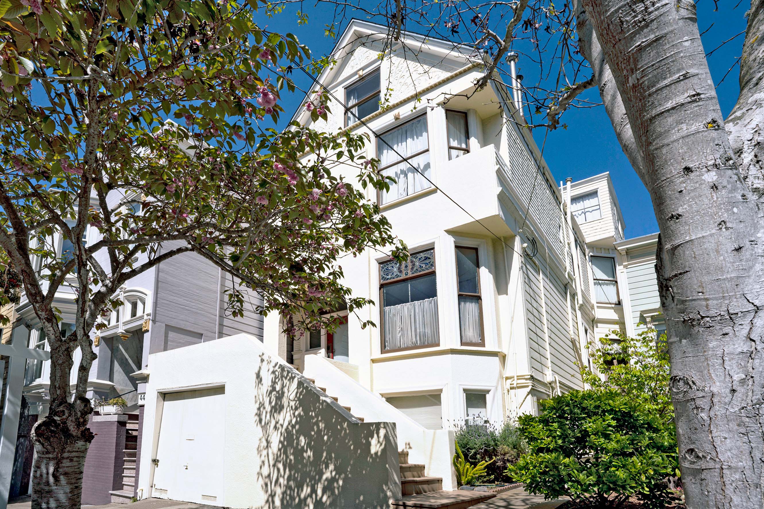 View of 38 Lyon street, featuring a home with white facade