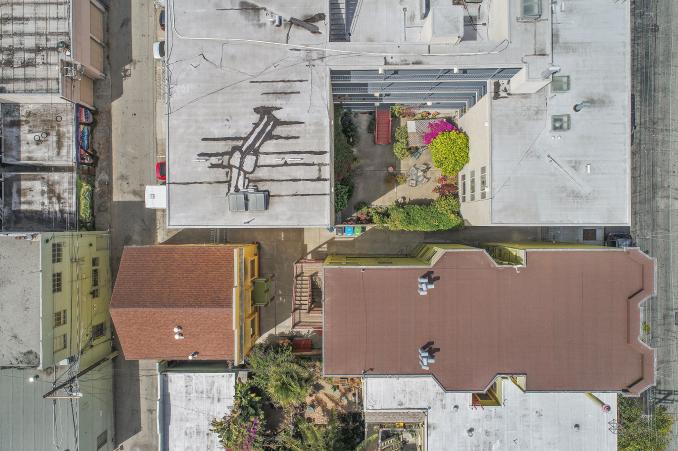 Property Thumbnail: Aerial view looking down at 464-468 Bartlett Street, showing a larger property to the right, and a smaller stand-along property to the left