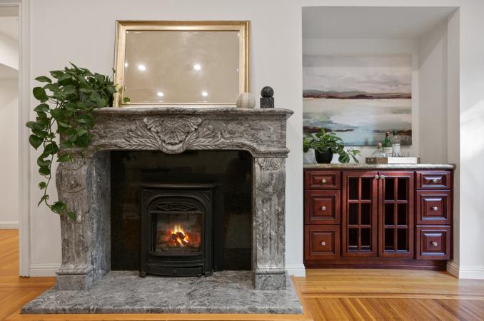 Property Thumbnail: Close-up of a fireplace with grey mantle