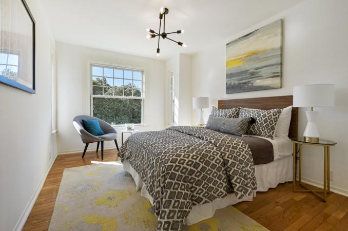 Property Thumbnail: View of bedroom three, featuring a large window 