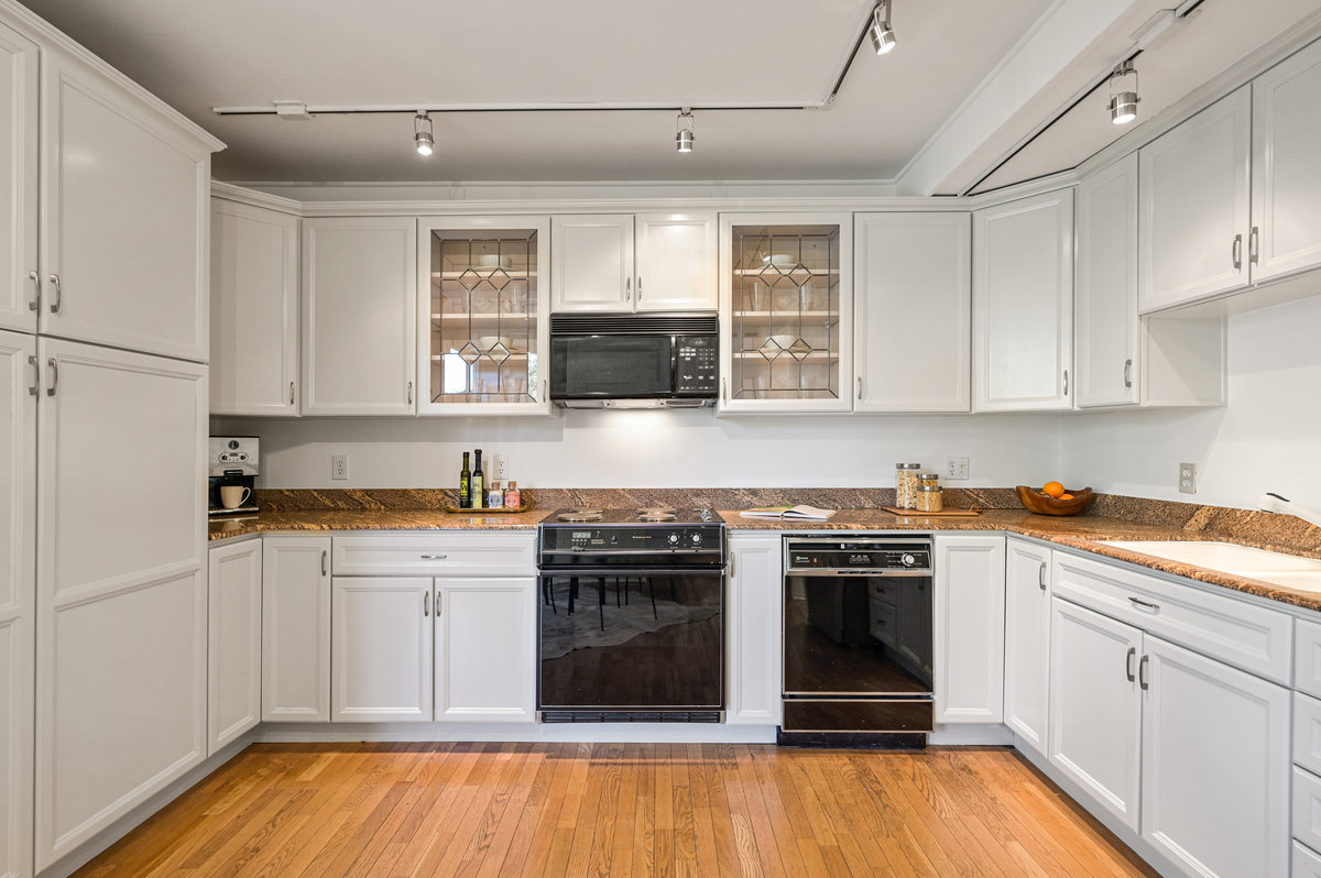 Property Photo: Kitchen with wrap-around counters and cabinets