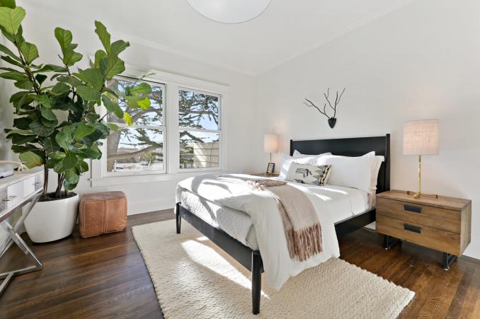 Property Thumbnail: View of bedroom two, showing a large room with lots of light and wood floors
