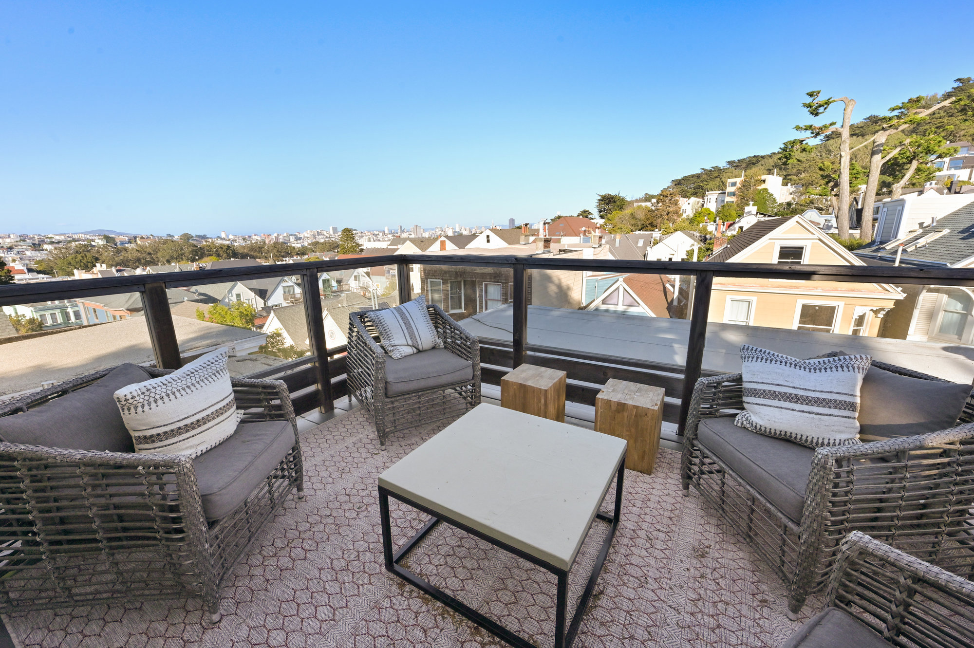 Property Photo: Side-view of the deck. Showing the panoramic views of the city