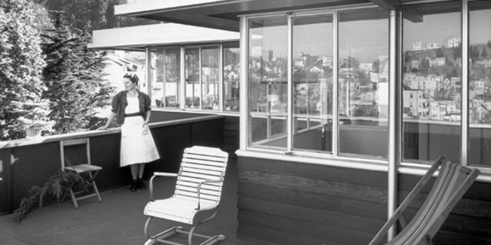 Property Photo: Vintage photo of 90 Woodland Ave or the Darling House, showing a person looking out over the city
