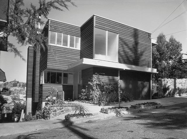 Property Photo: Exterior view of 90 Woodland Ave, showing a home with wood facade