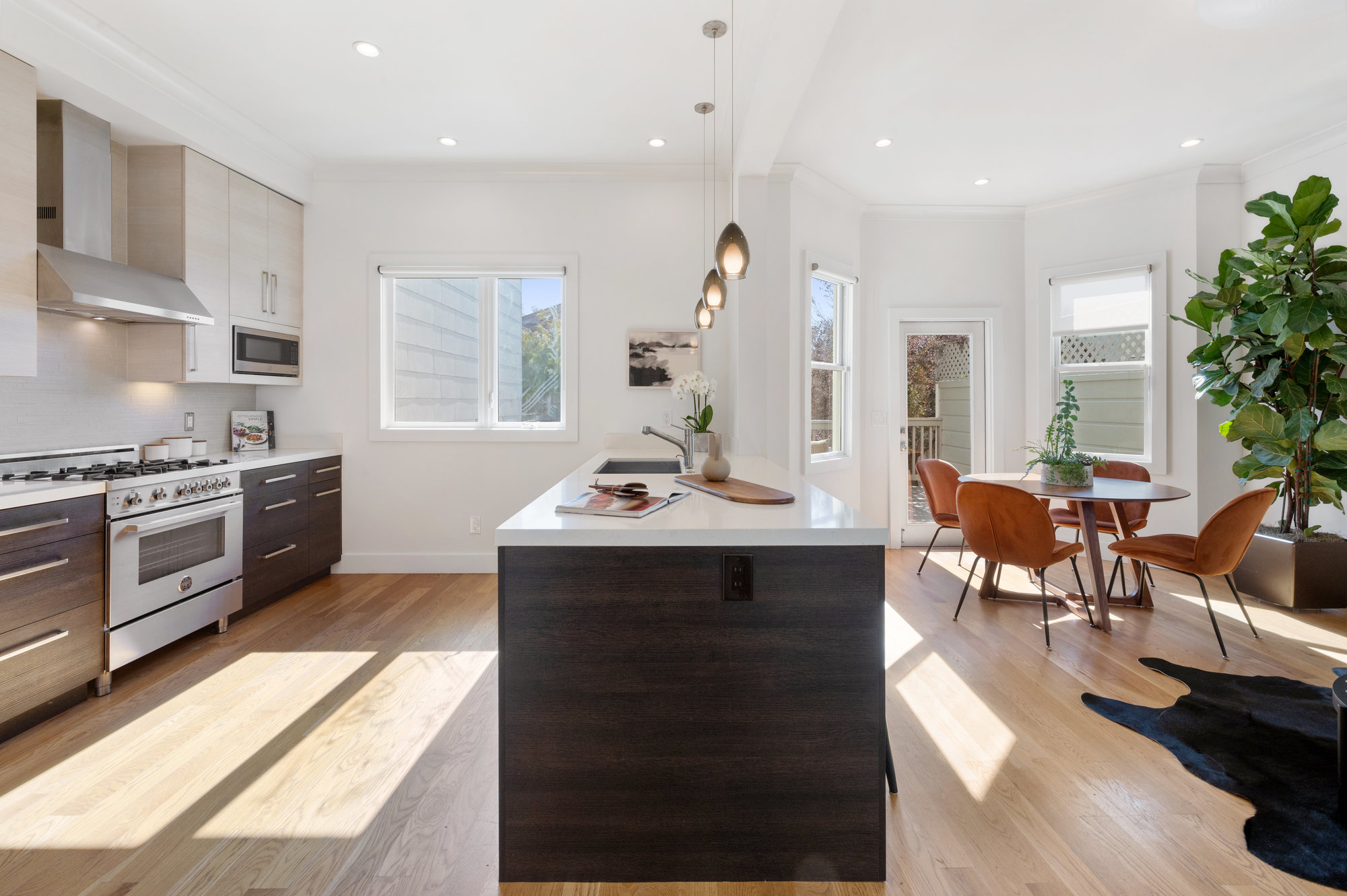 Property Photo: Open floor-plan view of 719 18th Avenue, showing the kitchen and main living area