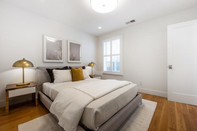 Property Thumbnail: Bedroom four, featuring a large window and plenty of natural light