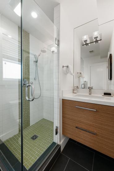 Property Thumbnail: View of a bathroom with glass shower and vanity