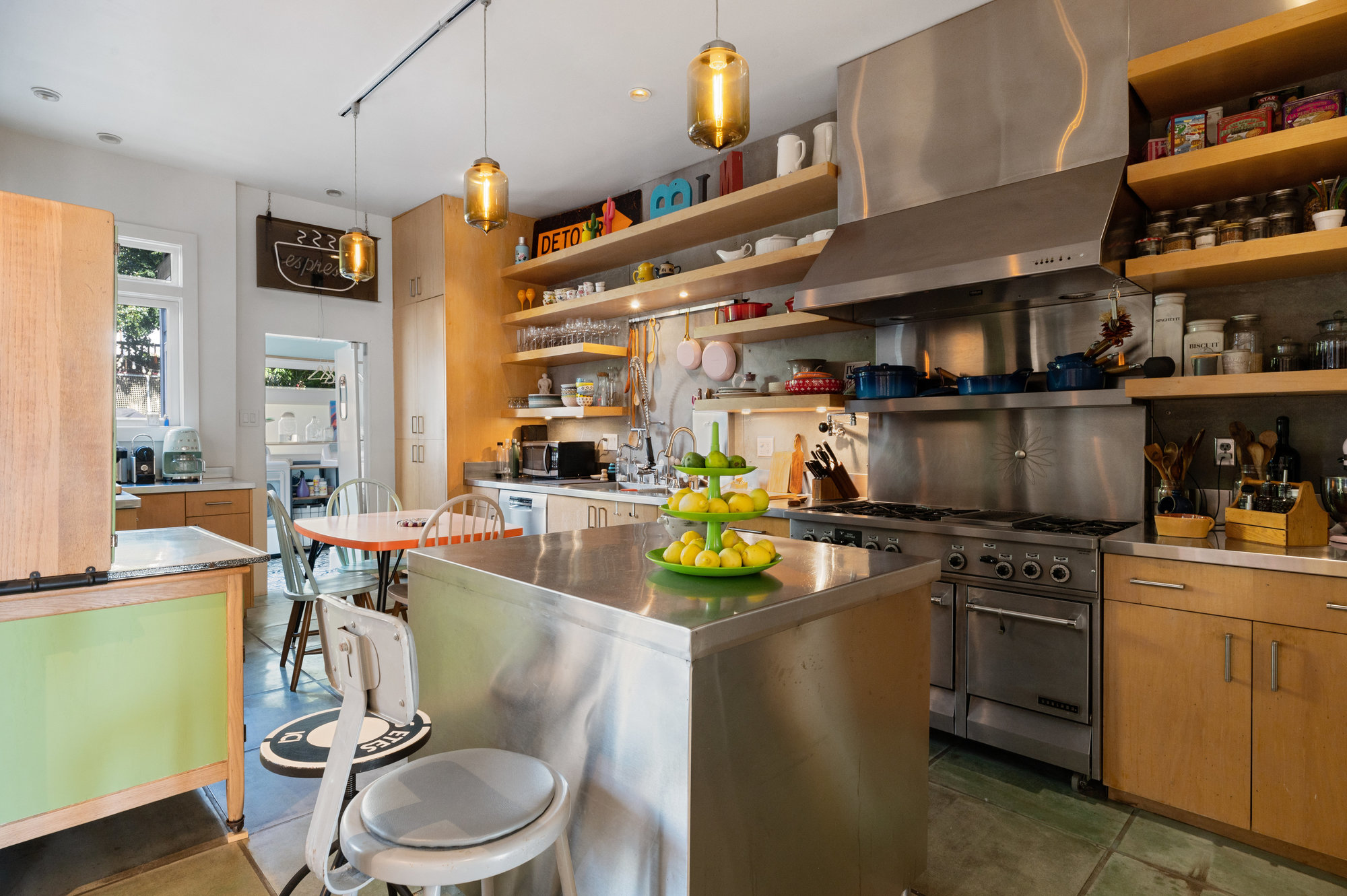 Property Photo: View of the large chefs kitchen featuring tile floors