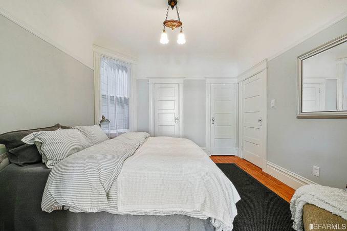 Property Thumbnail: A bedroom with wood floors