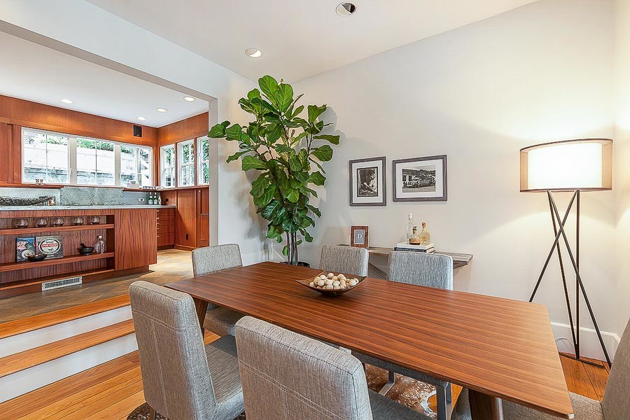 Property Photo: Dining room, featuring steps to the kitchen