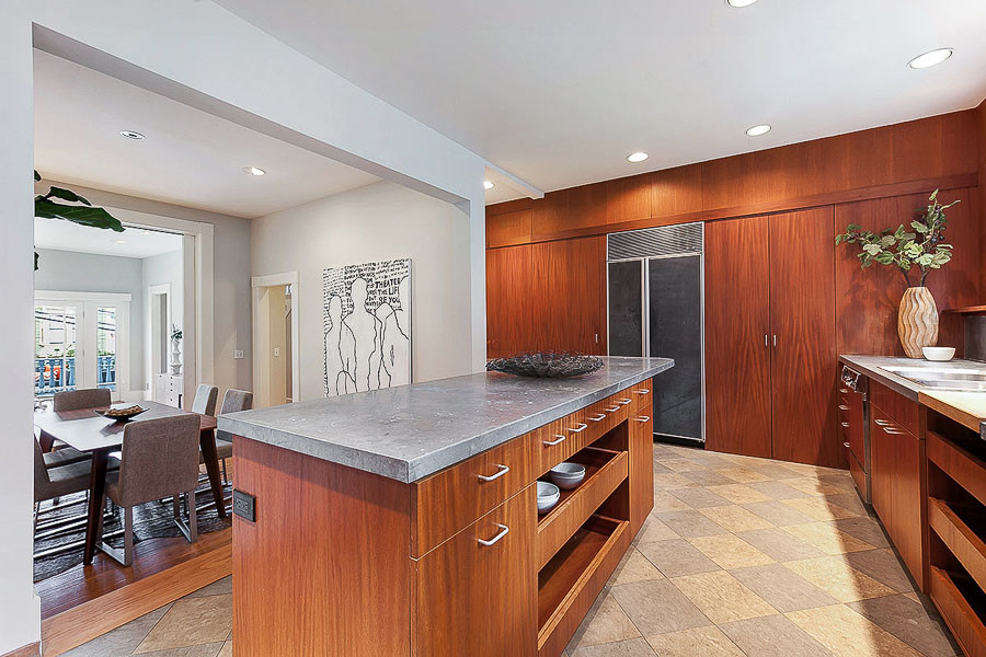 Property Photo: View of the kitchen, showing a large island cabinet 