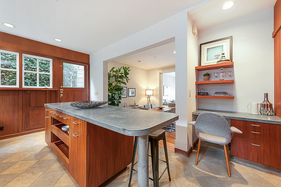 Property Photo: View of the island cabinet with seating