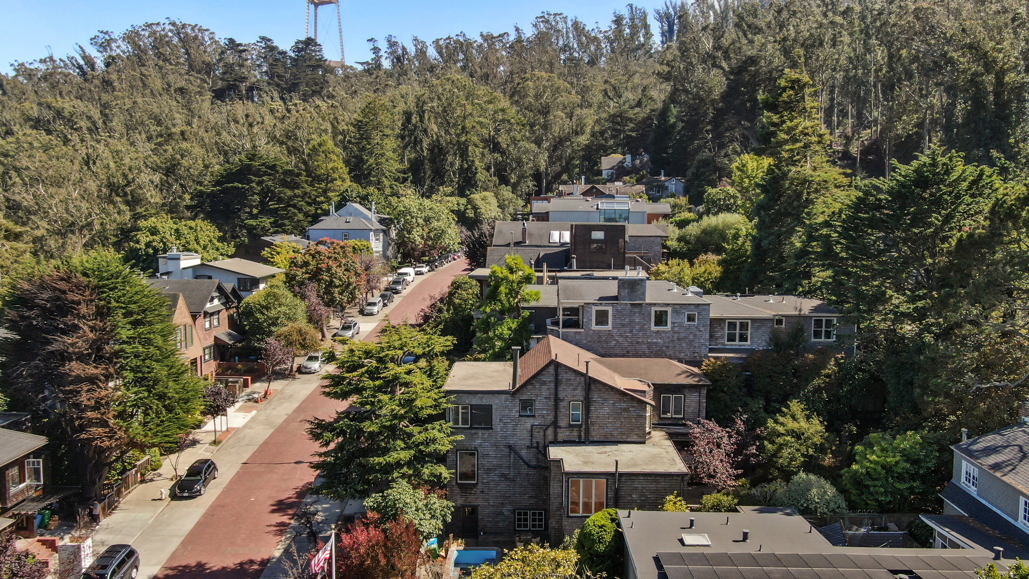 Property Photo: Close-up aerial view of 183 Edgewood Avenue, showing a home with wood facade