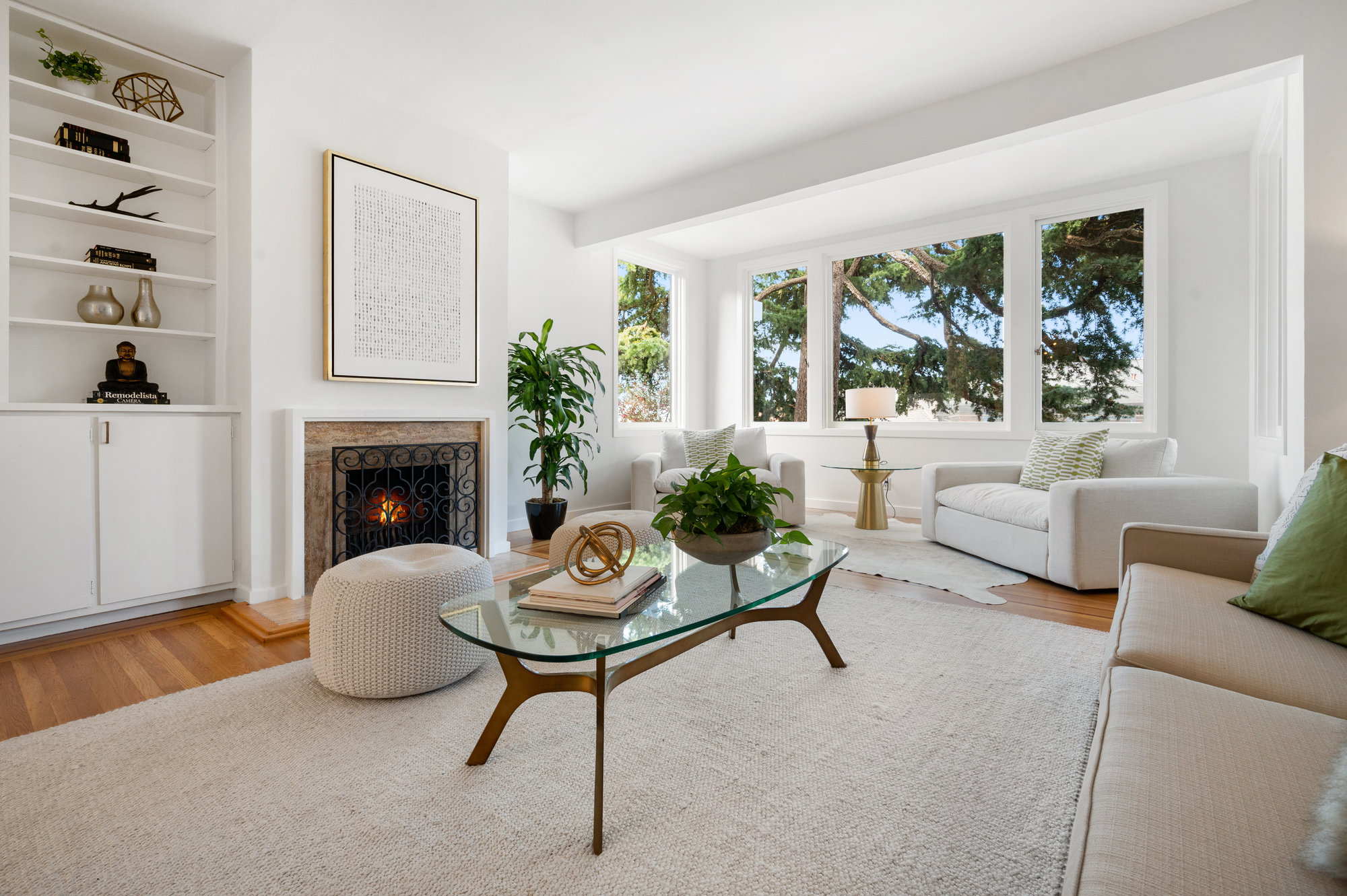 Property Photo: Side-view of the living room at 183 Edgewood Avenue, featuring large windows