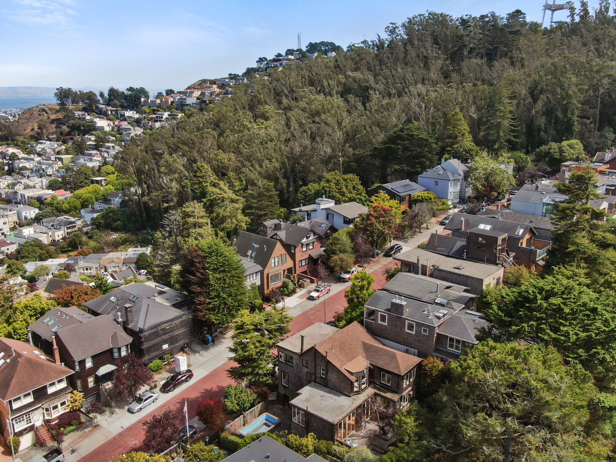 Property Photo: Aerial view of 183 Edgewood Avenue, showing Sutro tower and San Francisco Bay