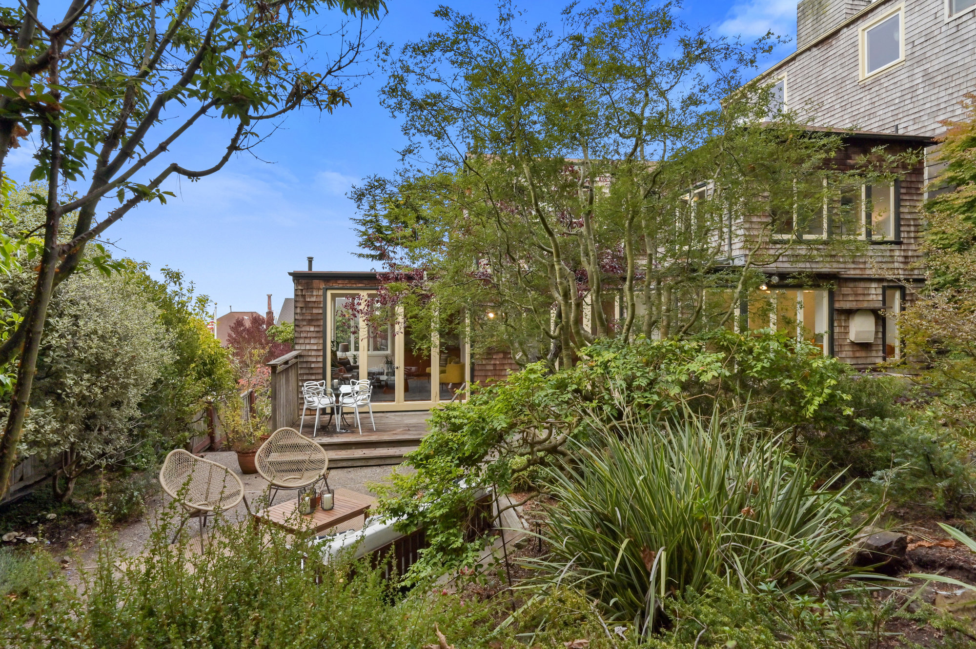 Property Photo: Rear gardens and lush plant life at 183 Edgewood Avenue in Cole Valley