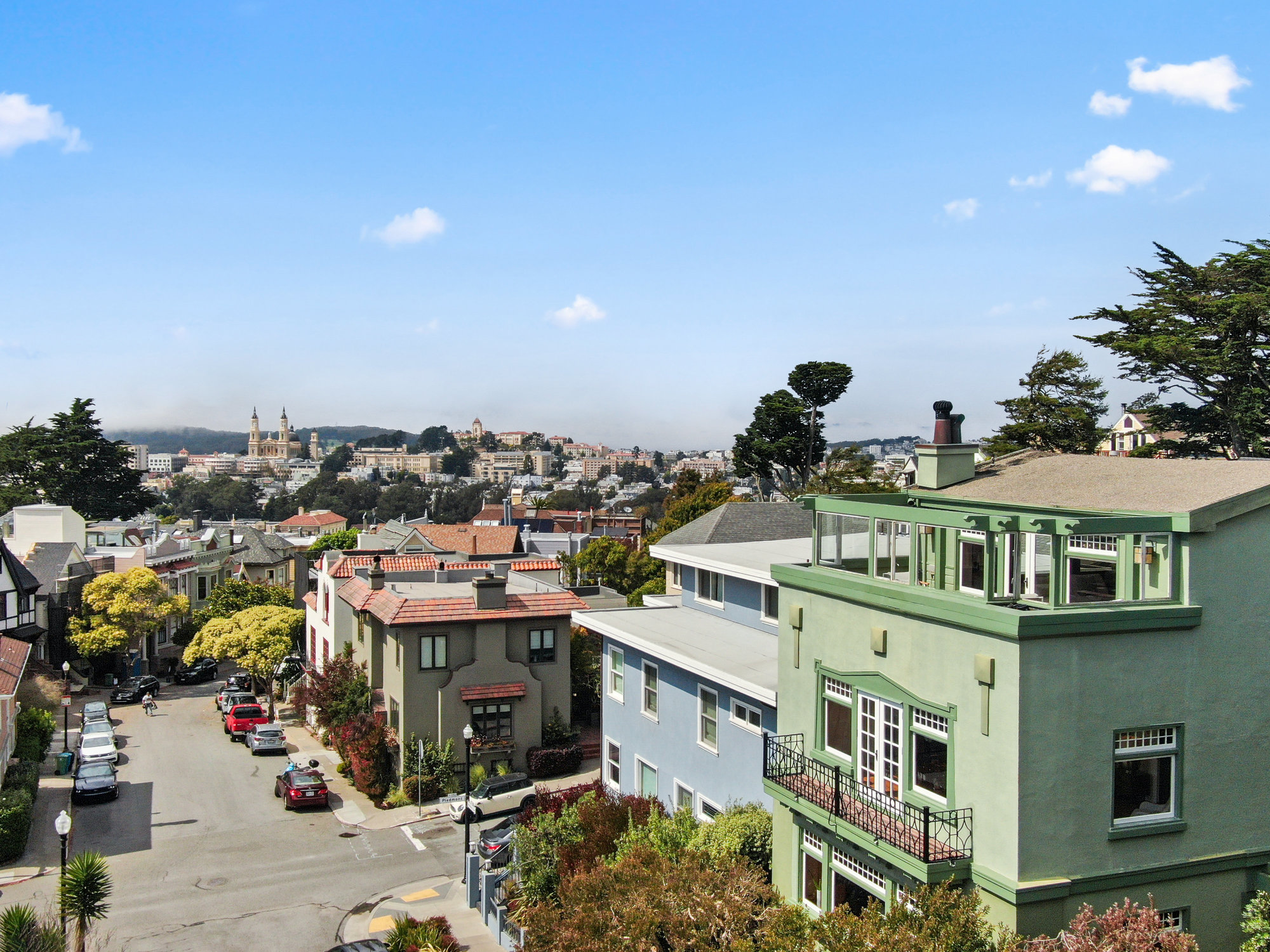 Property Photo: Street view of 4 Ashbury Terrace, showing the large homes lining the streets in the Ashbury Heights neighborhood