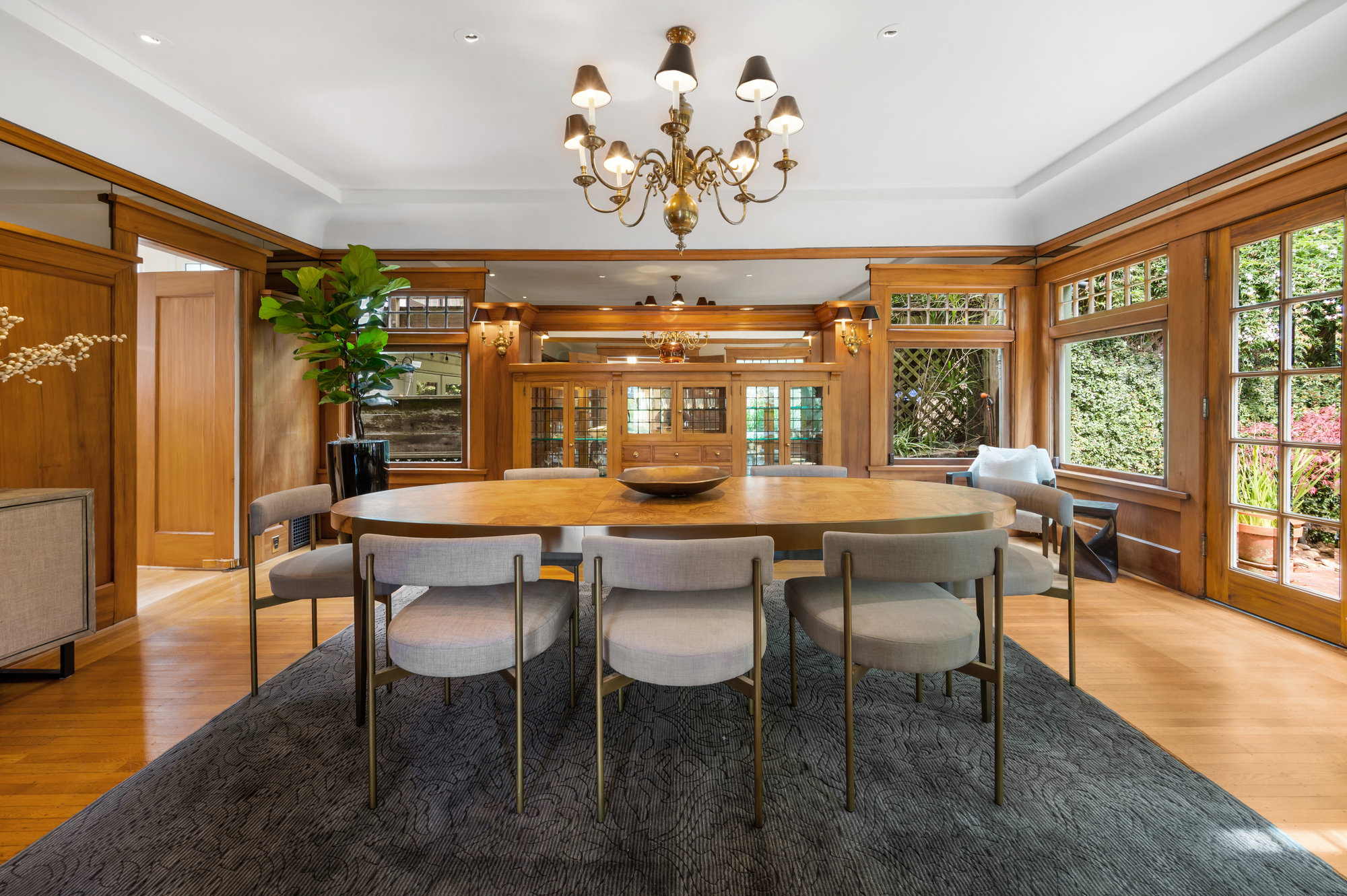 Property Photo: Formal dining room with wood framed doors and large windows