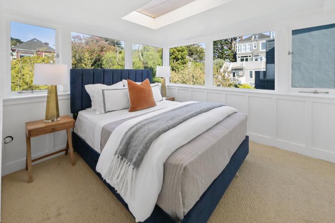 Property Thumbnail: Upper bedroom with side-by-side windows 