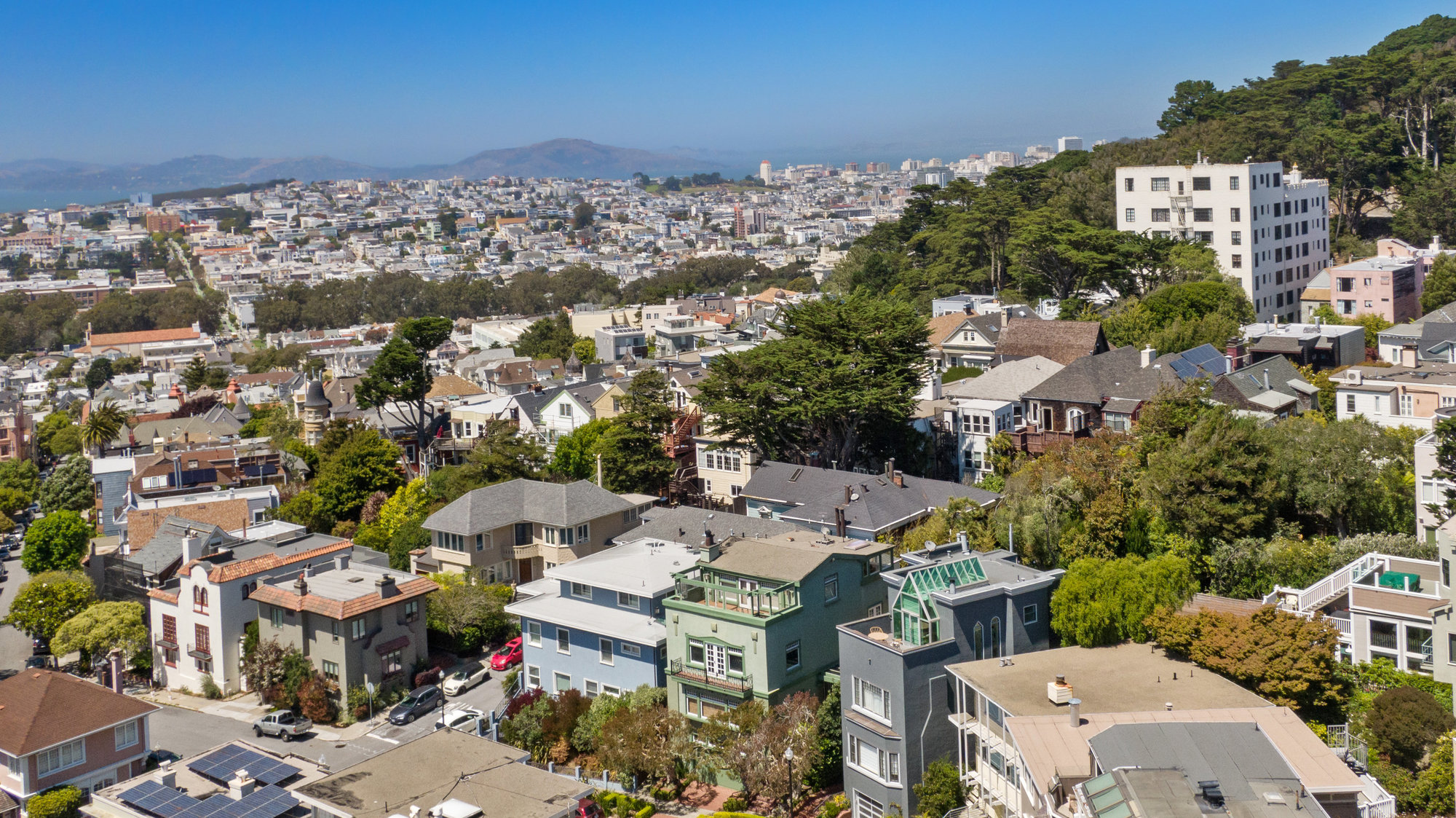 Property Photo: Aerial view of listing 4 Ashbury Terrace, showing proximity to Buena Vista Park and downtown San Francisco 