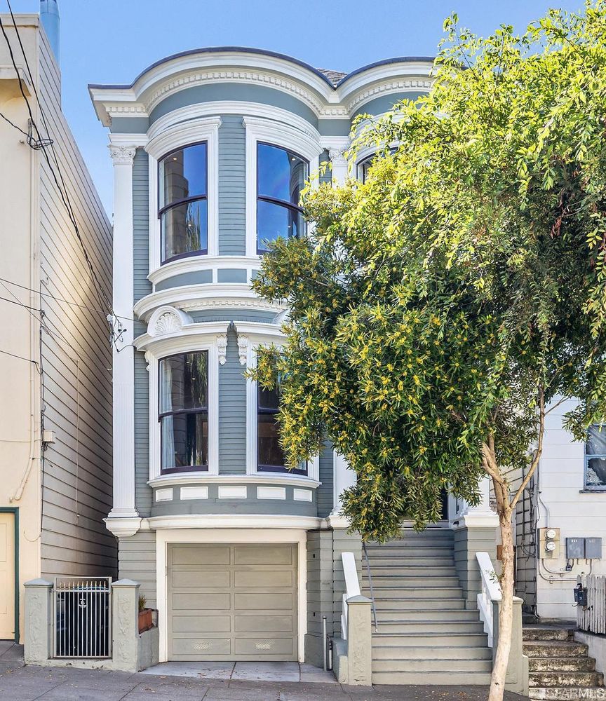 Property Photo: Front exterior view of 286 Fair Oaks St in Noe Valley, showing a large Victorian home purchased through John DiDomenico San Francisco top agent