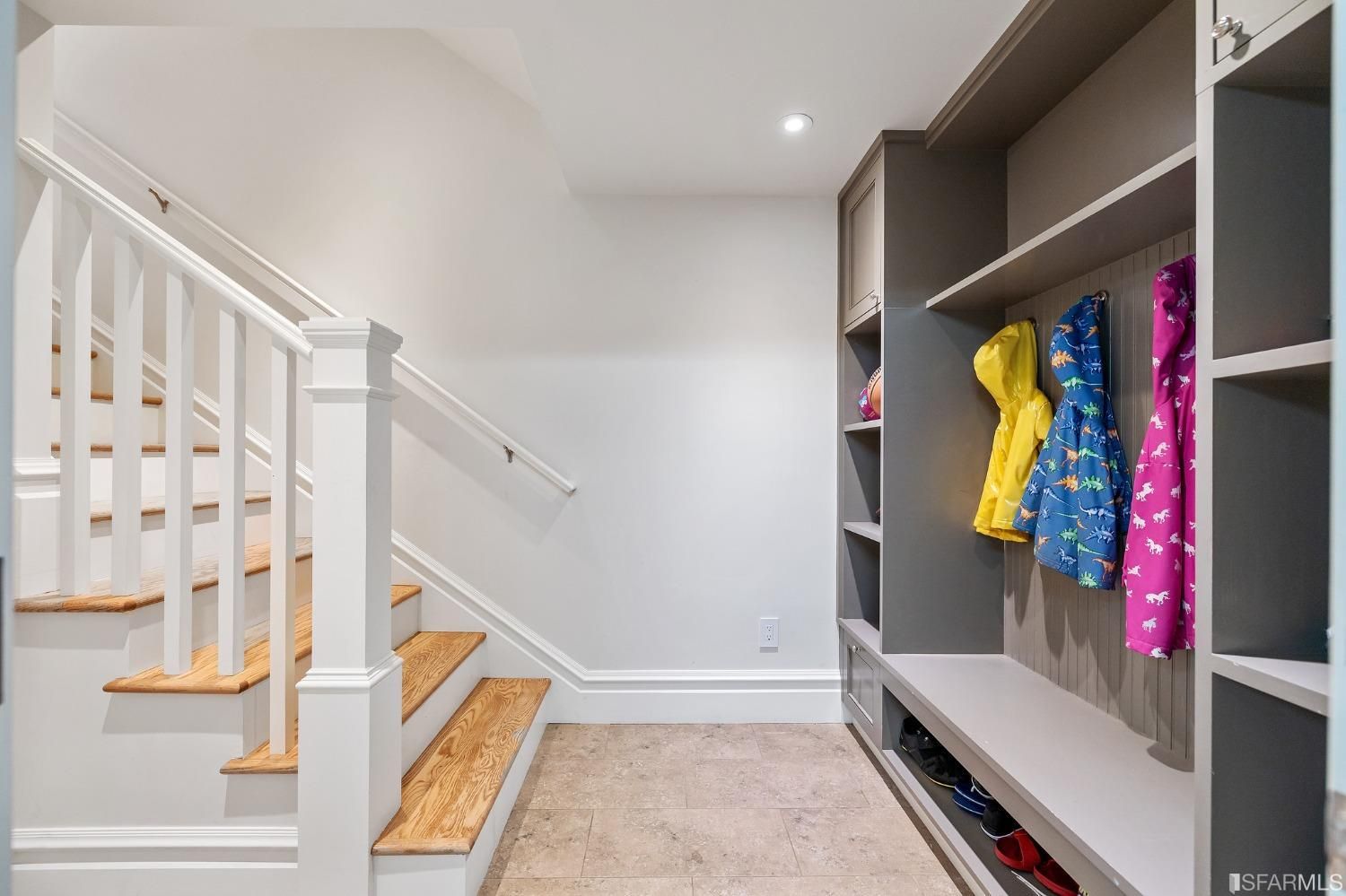 Property Photo: Lower level entry area with storage cubby for shoes and coats
