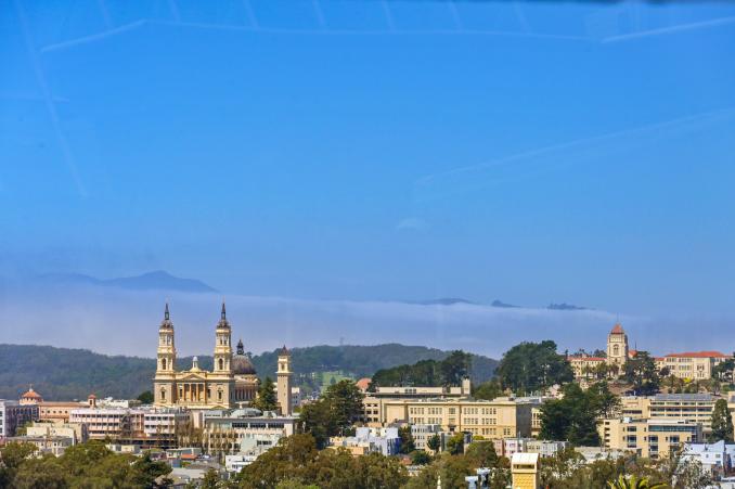 Property Thumbnail: View of the Mission and St Ignatius Church in San Francisco, as seen from 4 Ashbury Terrace