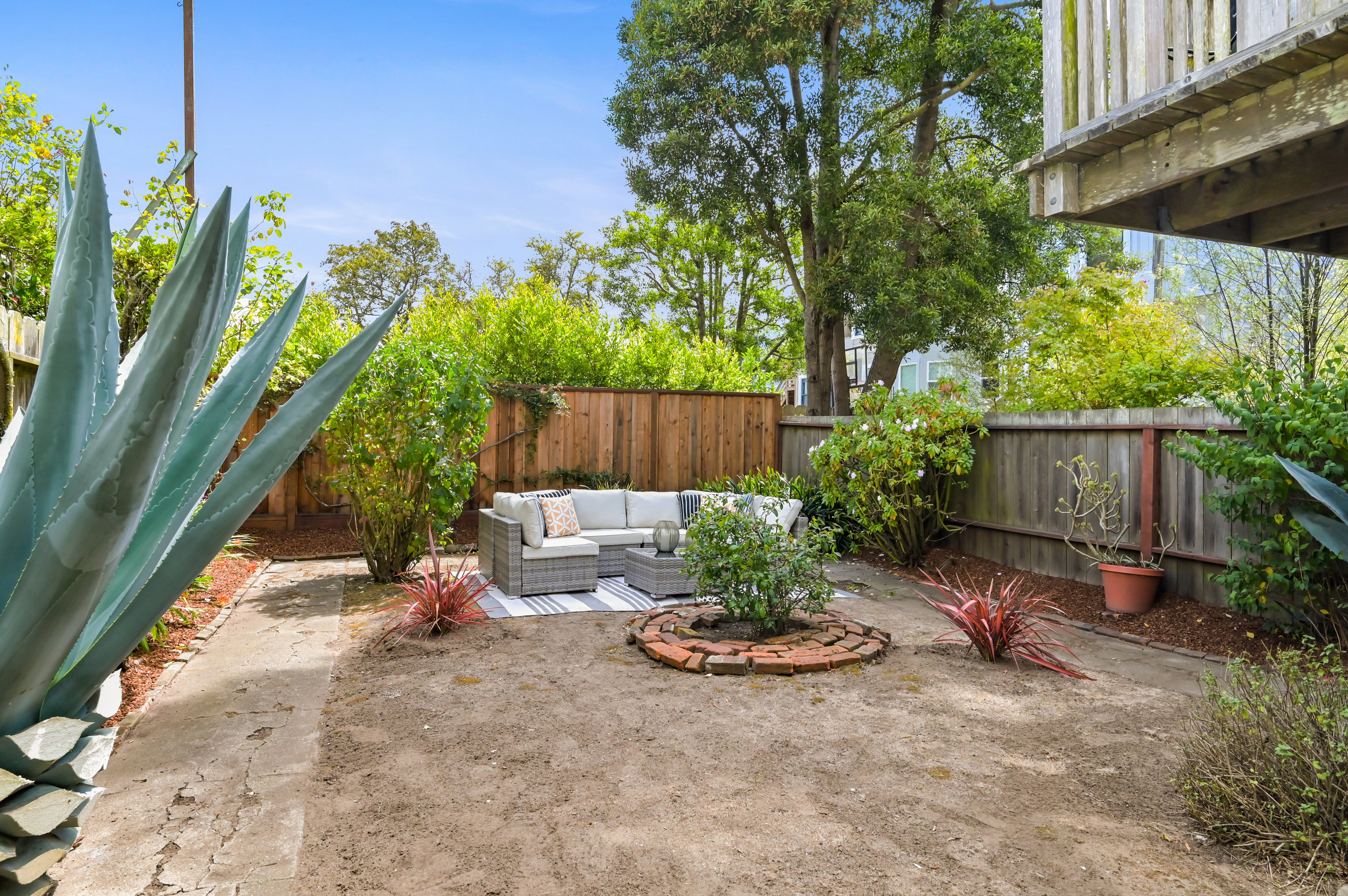 Property Photo: View of the private yard at 637-639 Lake Street, showing an outdoor living area