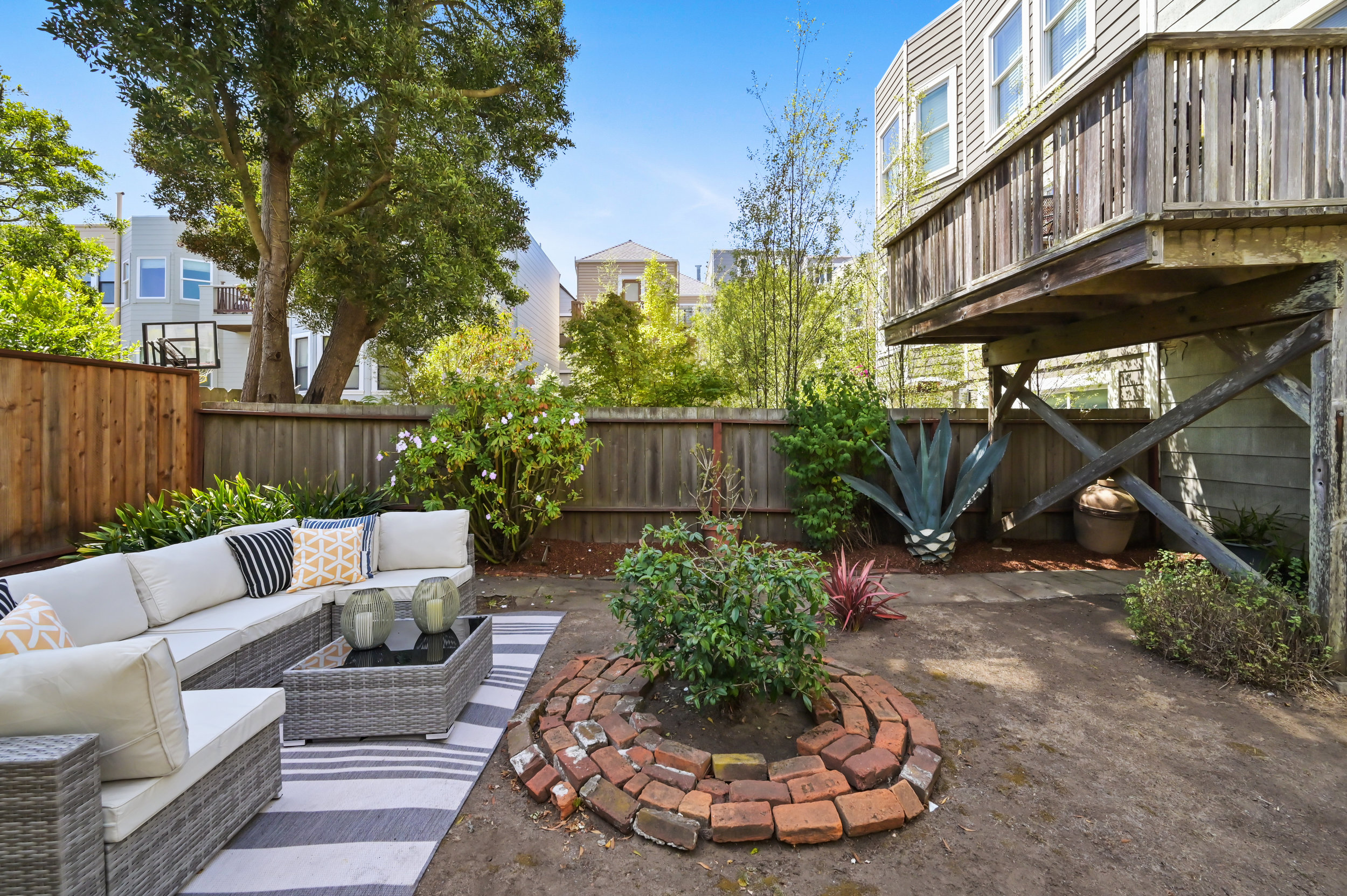 Property Photo: Outdoor living area with fenced in yard for privacy