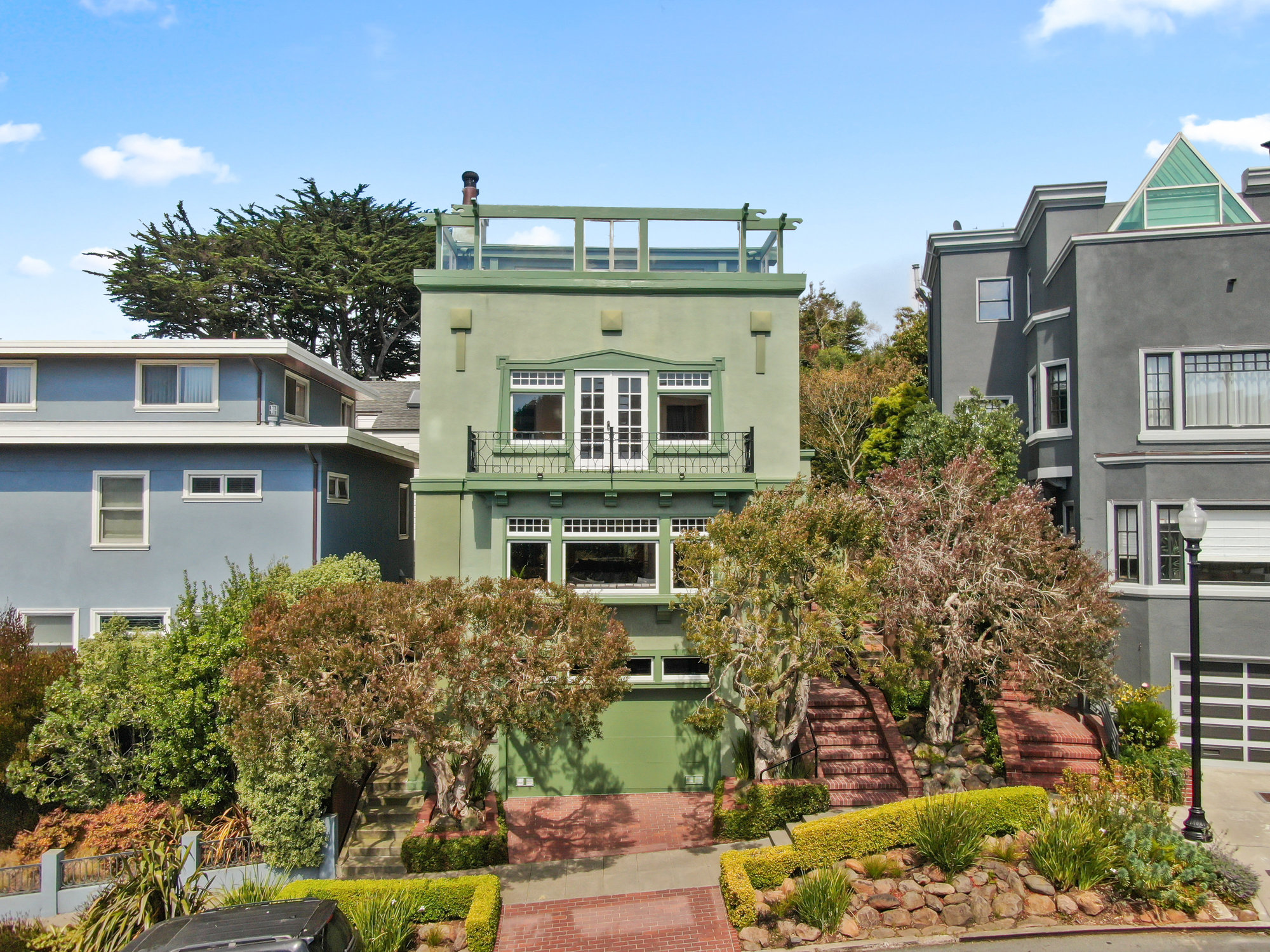 Property Photo: Front facade of 4 Ashbury Terrace, in Buena Vista San Francisco, sold by agent John DiDomenico