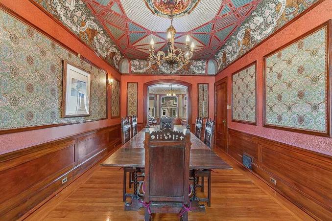 Property Thumbnail: Dining room, featuring an elaborate ceiling with crown moulding 
