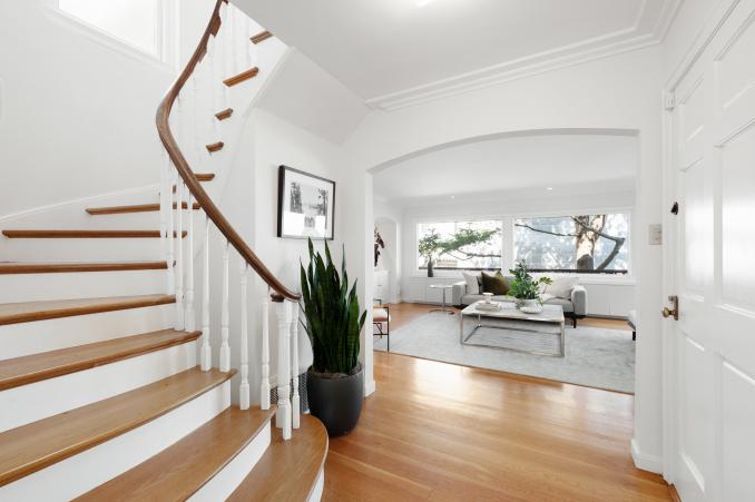 Property Thumbnail: Large wooden steps leading to the second level