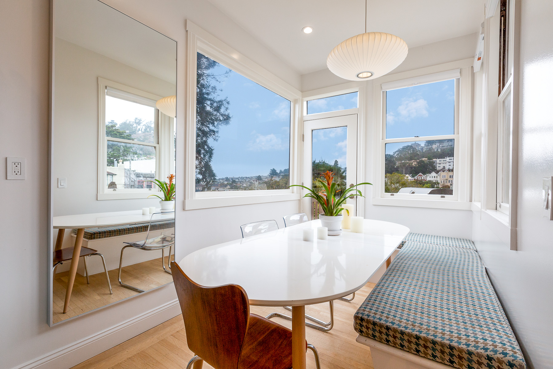 Property Photo: View of the dining area and the spectacular views of the Cole Valley neighborhood and beyond