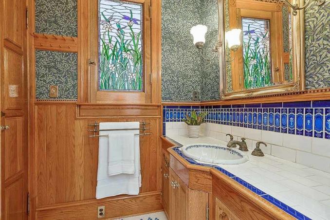 Property Thumbnail: View of a bathroom with lavish woodwork and a sink